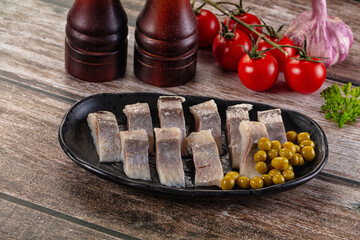 Slided marinated salted herring fillet