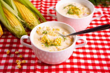 Delicious creamy corn soup in a bowl. Autumn food. Harvest concept