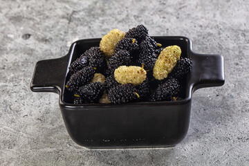 Ripe sweet juicy black and white mullberry