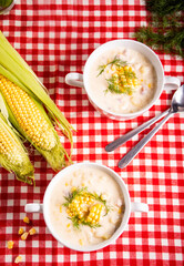 Delicious creamy corn soup in a bowls. Autumn food. Harvest concept