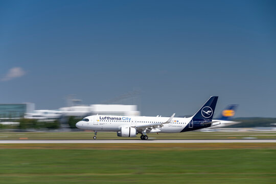Lufthansa City Airlines Airbus A320neo with the aircraft 
registration D-AIJM 
during landing to the southern runway 26L of the Munich Airport MUC EDDM