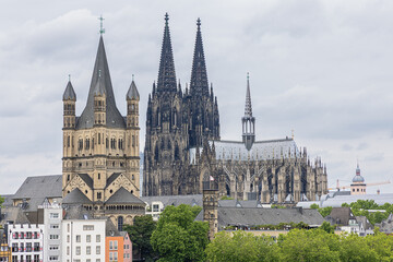 Close up of the Great St. Martin Church with the Cologne Cathedral, seen from the right bank of the Rhine © Vermeulen-Perdaen