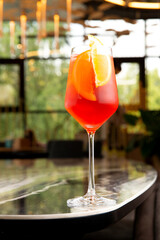 Red cocktail. On background. Selective focus.