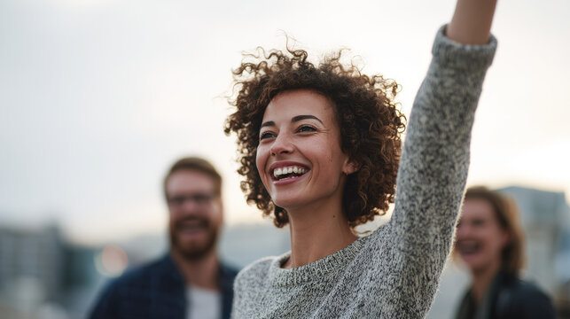 group of colleagues celebrates successful launch of pride project against urban skyline