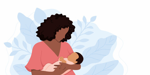 African American mother holding her newborn baby with love and care
