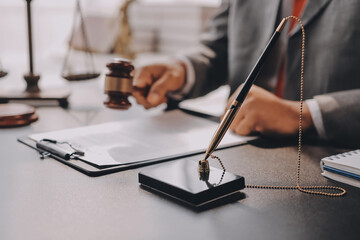 Lawyer explained to the client about the law that must be brought against the court case.