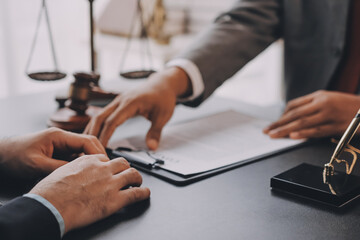 Lawyer explained to the client about the law that must be brought against the court case.