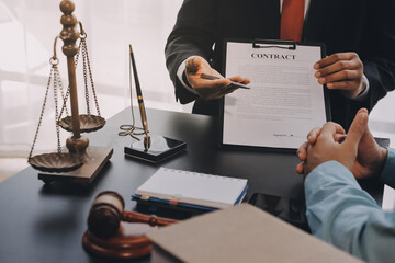 Lawyer explained to the client about the law that must be brought against the court case.