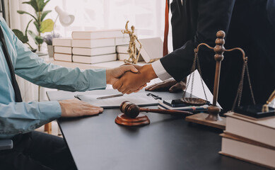 Lawyer explained to the client about the law that must be brought against the court case.