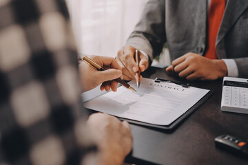 Car salesman gave the keys to the customers who signed the purchase contract legally, Successful...