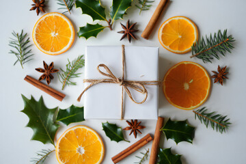 Festive christmas gift arrangement with oranges isolated on white background