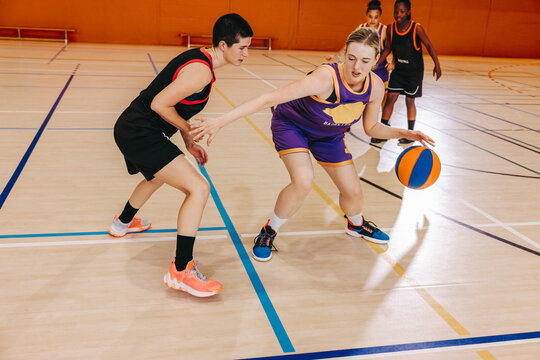 Game face on: Female basketball players in the heat of competition