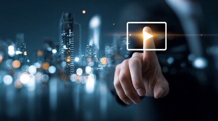 Person's finger activating video play button in city lights