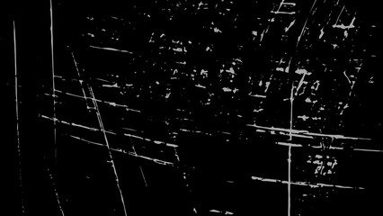 Abstract black and white scratched film texture overlay, perfect for adding a retro or damaged effect to your designs