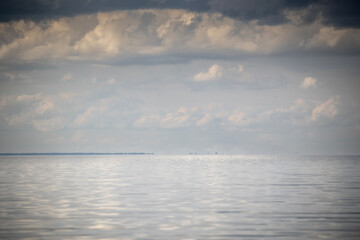 A superior mirage is visible on the horizon of the Kyiv Sea, Ukraine. The optical phenomenon...