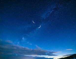 Starry night sky with crescent moons