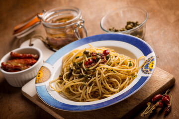 spaghetti with anchovies dried tomatoes and capers