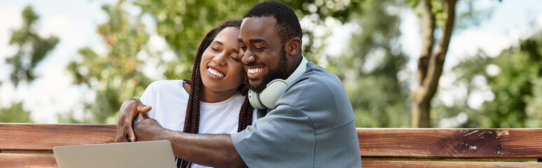 Young couple enjoys a romantic stroll through a vibrant outdoor setting in the afternoon light