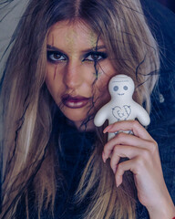 creepy halloween portrait woman with witch face makeup