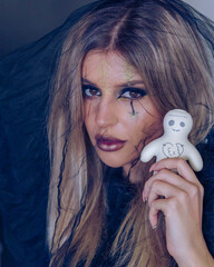 creepy halloween portrait woman with witch face makeup