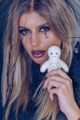 creepy halloween portrait woman with witch face makeup