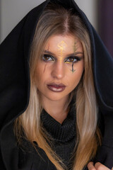 creepy halloween portrait woman with witch face makeup