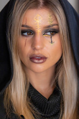creepy halloween portrait woman with witch face makeup