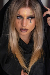 creepy halloween portrait woman with witch face makeup