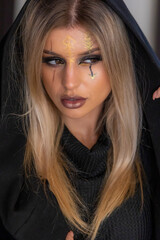 creepy halloween portrait woman with witch face makeup