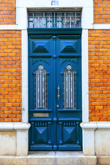  Rich decoration of идгу door of vintage house in Faro, Algarve, Portugal
