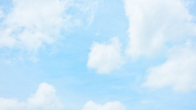 A serene sky background with soft white clouds on a light blue backdrop, creating a feeling o Ofp peace, freedom, and openness. Perfect for nature, weather, or inspirational themes