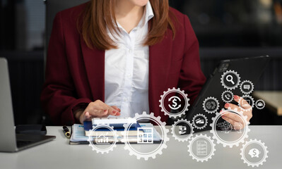 Businesswoman doing finances and calculate to analysis graph company financial about cost at office.