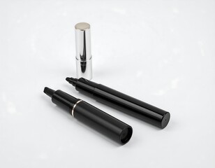Obraz premium Two black markers and a silver lipstick