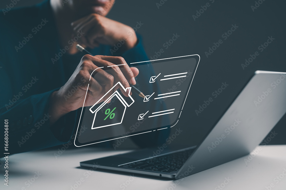Poster a professional analyzing property metrics on a laptop, with a digital overlay of a house and checkma