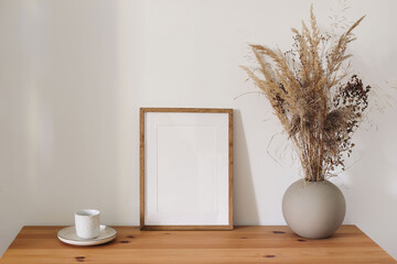 Elegant interior still life, minimal home design. Blank wooden picture frame poster mockup. Ball...