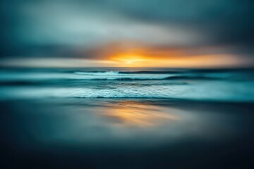 Obraz premium Golden Sunset Over Calm Coastal Waters