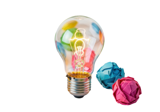 Light bulb emitting glowing light surrounded by colorful crumpled paper balls isolated PNG with Transparent Background