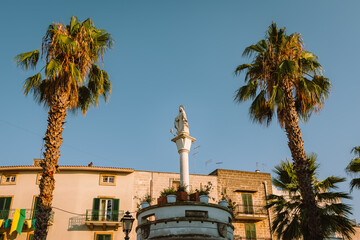 Religious statue in the historic center of Oria, Brindisi at sunset