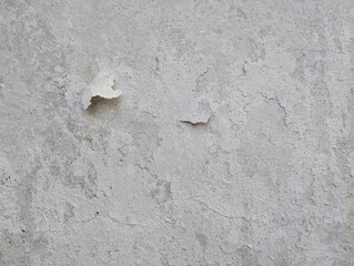 Close up of grunge old wall weathered with peeling paint texture background