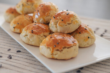 turkish savory pastry pogaca with dill and black sesame or cumin, homemade quick snack