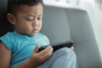 boy using mobile phone