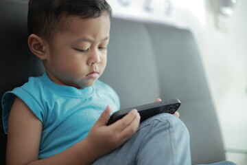 boy using mobile phone