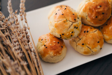 Fototapeta premium turkish savory pastry pogaca with dill and black sesame or cumin, homemade quick snack