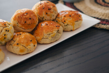 turkish savory pastry pogaca with dill and black sesame or cumin, homemade quick snack