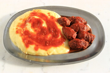 Mashed Potatoes and Meatballs in Tomato Sauce