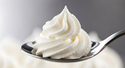 Spoonful of Fresh Whipped Cream: A Culinary Delight.