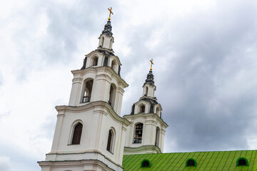 Holy Spirit Cathedral church and dark storm clouds in Minsk Belarus.