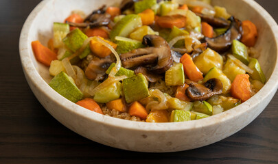 vegetarian quinoa bowl with zucchini carrots mushrooms roasted fall food