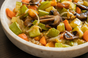 vegetarian quinoa bowl with zucchini carrots mushrooms roasted fall food