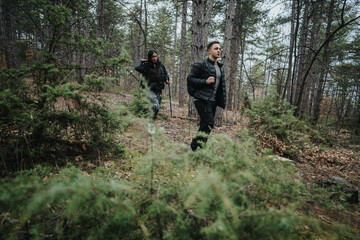 Fototapeta premium Two friends hike through a serene wooded forest under an overcast sky, enjoying outdoor adventure and exploring the natural environment together.
